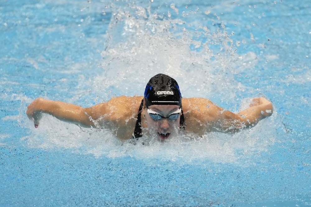 Gretchen Walsh swims during the Women's 100 Butterfly Saturday, June 15, 2024, at the US Swimming Olympic Trials in Indianapoils. (AP Photo/Darron Cummings)