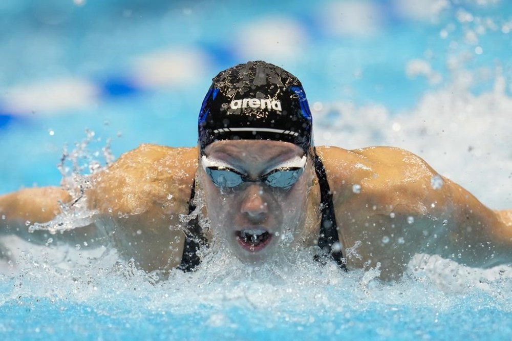 Gretchen Walsh swims during the Women's 100 Butterfly Saturday, June 15, 2024, at the US Swimming Olympic Trials in Indianapoils. (AP Photo/Darron Cummings)