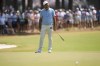 Scottie Scheffler reacts after missing a putt on the seventh hole during the third round of the U.S. Open golf tournament Saturday, June 15, 2024, in Pinehurst, N.C. (AP Photo/Matt York)