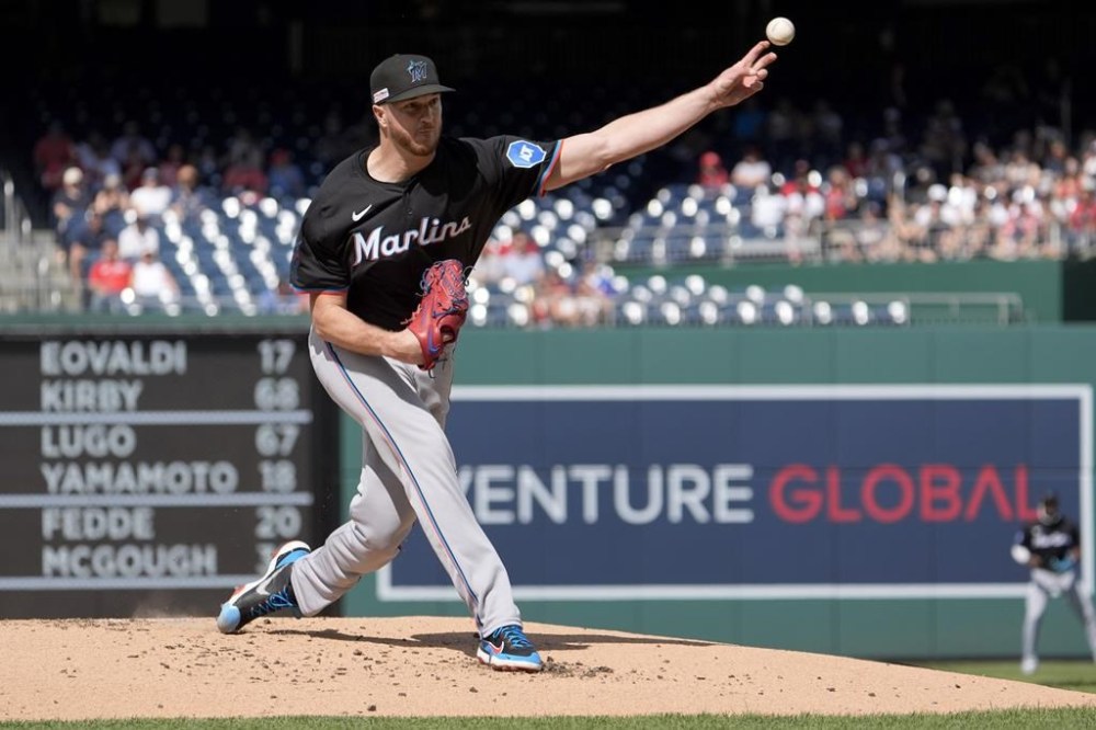 Miami Marlins pitcher Trevor Rogers (28) pitches against the Washington Nationals during the first inning of a baseball game at Nationals Park, Saturday, June 15, 2024, in Washington. (AP Photo/Jacquelyn Martin)