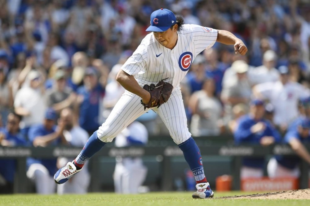 Chicago Cubs starting pitcher Shota Imanaga celebrate after striking out St. Louis Cardinals' Brendan Donovan during the seventh inning of a baseball game Saturday, June 15, 2024, in Chicago. Chicago won 5-1. (AP Photo/Paul Beaty)