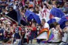New England Revolution fans celebrate a goal during the first half of an MLS soccer match against the Vancouver Whitecaps, Saturday, June 15, 2024, in Foxborough, Mass. (AP Photo/Mark Stockwell)