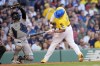 Boston Red Sox's Rafael Devers ducks away from a high pitch from New York Yankees' Carlos Rodón during the first inning of a baseball game Saturday, June 15, 2024, in Boston. (AP Photo/Robert F. Bukaty)
