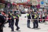 Police cordon off an area near the Reeperbahn in Hamburg, Germany, Sunday, June 16, 2024. German police say officers have shot and wounded a man who was threatening them with an axe and a firebomb in the northern city of Hamburg, hours before the city hosts a match in the Euro 2024 soccer tournament. (Bodo Marks/dpa via AP)