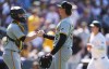 Pittsburgh Pirates catcher Jason Delay, left, congratulates relief pitcher Kyle Nicolas after a baseball game against the Colorado Rockies, Sunday, June 16, 2024, in Denver. (AP Photo/David Zalubowski)