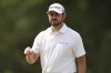 Patrick Cantlay waves after making a putt on the eighth hole during the final round of the U.S. Open golf tournament Sunday, June 16, 2024, in Pinehurst, N.C. (AP Photo/Matt York)