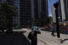 Environment Canada says a heat wave descending on parts of Ontario this week is expected to bring dangerously high temperatures. A man carries a case of water bottles between the high rises of St. James Town in Toronto, Wednesday, July 5, 2023. THE CANADIAN PRESS/Cole Burston