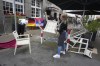 People cleaning up the trash after fans clashes ahead the Group C match between Serbia and England at the Euro 2024 soccer tournament in Gelsenkirchen, Germany, Sunday, June 16, 2024. (AP Photo/Markus Schreiber)
