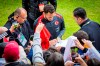 Turkey's Hakan Çalhanoglu signs autographs during training session ahead of the Euro 2024 soccer tournament in Barsinghausen, Germany, Wednesday, June 12, 2024. (Moritz Frankenberg/dpa via AP)