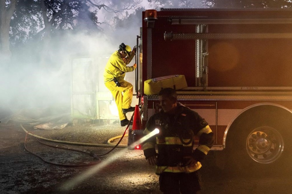 Firefighters battle the Point Fire burning along West Dry Creek Road in Healdsburg, Calif., on Sunday, June 16, 2024. (AP Photo/Noah Berger)