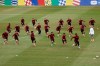 Switzerland's players warm up during a training session at the 