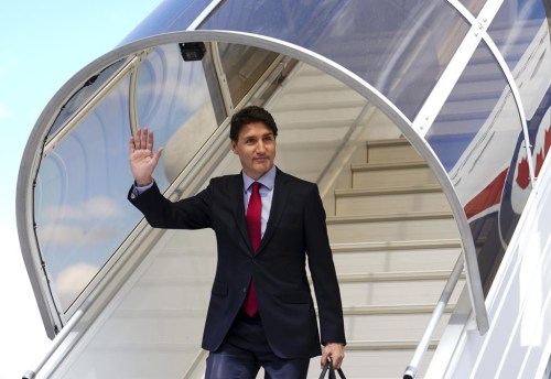 The federal government is dodging questions on whether or not tech giants should be paying Canadian news publishers for its content that AI chatbots are openly using. Prime Minister Justin Trudeau arrives in Zurich, Switzerland on Saturday, June 15, 2024. THE CANADIAN PRESS/Sean Kilpatrick