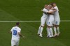 Slovakia players celebrate after teammate Slovakia's Ivan Schranz scored the opening goal during the Group E match between Belgium and Slovakia at the Euro 2024 soccer tournament in Frankfurt, Germany, Monday, June 17, 2024. (AP Photo/Themba Hadebe)