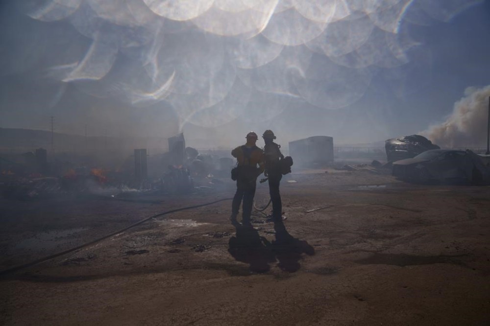 Firefighters work against the advancing Max Fire on Sunday, June 16, 2024, in Lancaster, Calif. (AP Photo/Eric Thayer)
