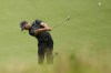 Xander Schauffele hits from the fairway on the eighth hole during the final round of the U.S. Open golf tournament Sunday, June 16, 2024, in Pinehurst, N.C. (AP Photo/Matt York)
