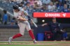 Boston Red Sox designated hitter Tyler O'Neill hits a solo home run against Toronto Blue Jays pitcher Yusei Kikuchi during first inning American League MLB baseball action in Toronto on Monday, June 17, 2024. THE CANADIAN PRESS/Nathan Denette