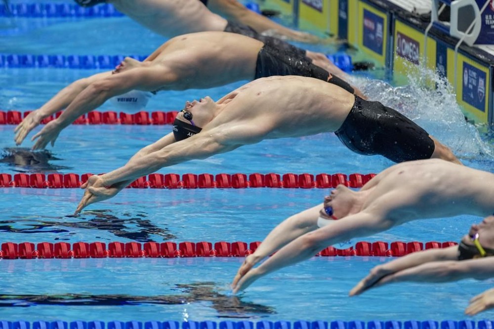 Ryan Murphy swims during the Men's 100 backstroke finals Monday, June 17, 2024, at the US Swimming Olympic Trials in Indianapolis. (AP Photo/Michael Conroy)