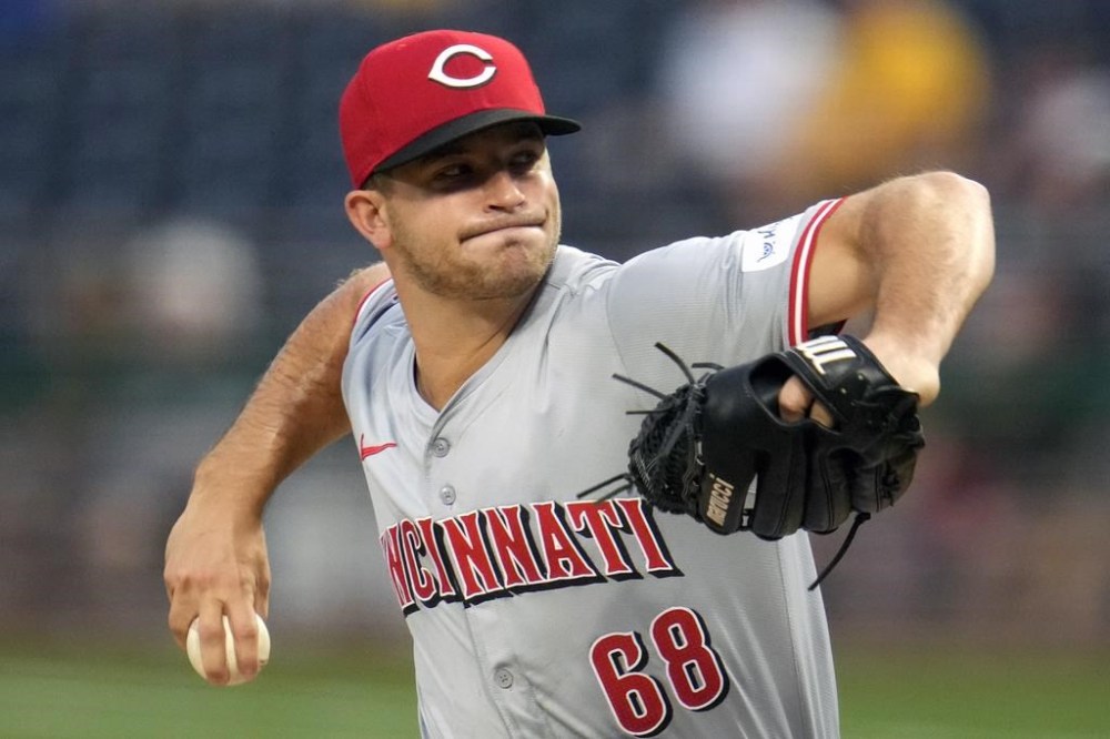 Cincinnati Reds starting pitcher Carson Spiers delivers during the first inning of a baseball game against the Pittsburgh Pirates in Pittsburgh, Monday, June 17, 2024. (AP Photo/Gene J. Puskar)
