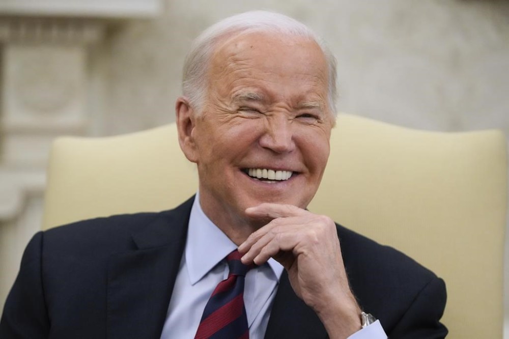 President Joe Biden smiles as he meets with NATO Secretary General Jens Stoltenberg in the Oval Office at the White House, Monday, June 17, 2024. (AP Photo/Mark Schiefelbein)
