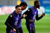 From left, Germany's Jamal Musiala, Leroy Sane and Antonio Rüdiger, run, during a training session, in Herzogenaurach, Germany, Monday, June 17, 2024. Germany will play Hungary in a Group A soccer match at the Euro 2024 soccer tournament on Wednesday. (Federico Gambarini/dpa via AP)