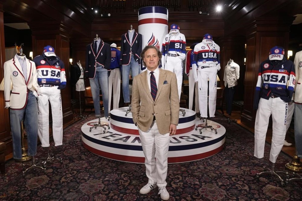 Chief Branding and Innovation Officer David Lauren unveils the Team USA Paris Olympics opening and closing ceremony uniforms at Ralph Lauren headquarters on Monday, June 17, 2024, in New York. (Photo by Charles Sykes/Invision/AP)
