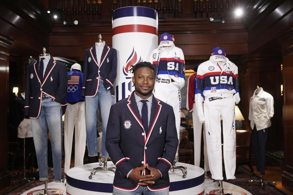 Olympic athlete in fencing, Daryl Homer, models the Team USA Paris Olympics opening ceremony uniform at Ralph Lauren headquarters on Monday, June 17, 2024, in New York. (Photo by Charles Sykes/Invision/AP)