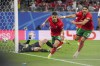 Portugal's Francisco Conceicao, centre, celebrates his side's second goal during a Group F match between Portugal and Czech Republic at the Euro 2024 soccer tournament in Leipzig, Germany, Tuesday, June 18, 2024. (AP Photo/Sunday Alamba)