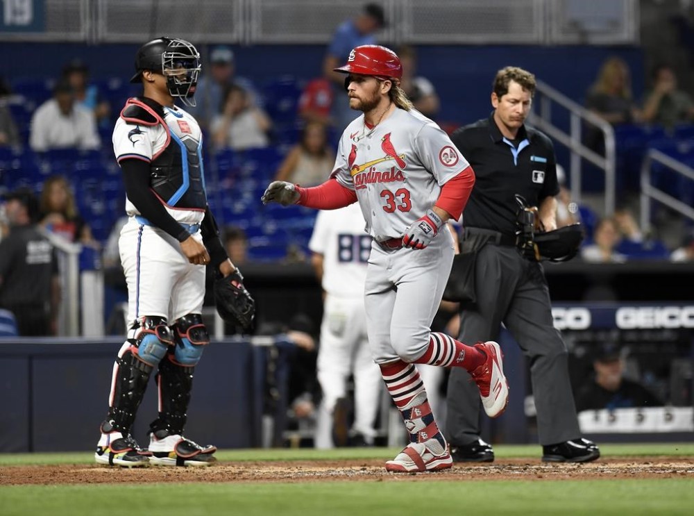 St. Louis Cardinals' Brendan Donovan scores on a home run against the Miami Marlins during the second inning of a baseball game Tuesday, June 18, 2024, in Miami. (AP Photo/Michael Laughlin)