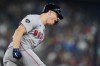 Boston Red Sox's Tyler O'Neill (17) celebrates his solo home run against the Toronto Blue Jays as he rounds the bases during eighth inning American League MLB baseball action in Toronto on Tuesday, June 18, 2024. THE CANADIAN PRESS/Nathan Denette