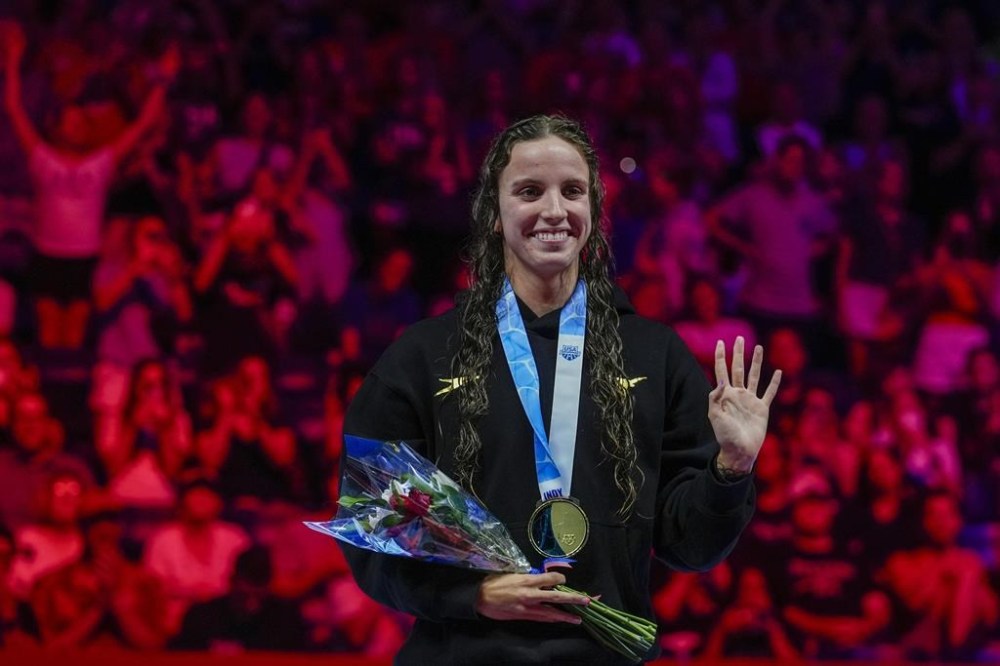 Regan Smith reacts after winning the Women's 100 backstroke finals Tuesday, June 18, 2024, at the US Swimming Olympic Trials in Indianapolis. (AP Photo/Darron Cummings)