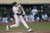 Oakland Athletics' Zack Gelof hits a three-run home run against the Kansas City Royals during the fourth inning of a baseball game in Oakland, Calif., Tuesday, June 18, 2024. (AP Photo/Jeff Chiu)