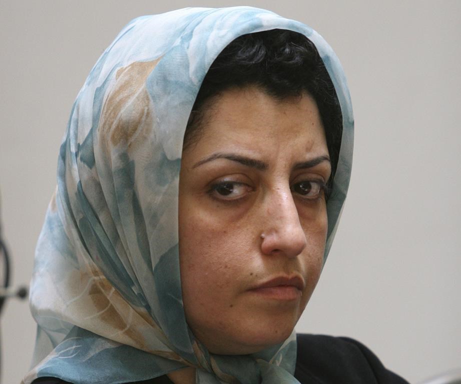 FILE - Prominent Iranian human rights activist Narges Mohammadi attends a meeting on women's rights in Tehran, Iran, on Aug. 27, 2007. Iran's imprisoned Nobel Peace Prize laureate Narges Mohammadi has been sentenced to another year in prison over her activism, her lawyer said Wednesday. (AP Photo/Vahid Salemi, File)