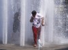 People try to beat the 30C heat in Montreal, Tuesday, June 18, 2024. THE CANADIAN PRESS/Ryan Remiorz