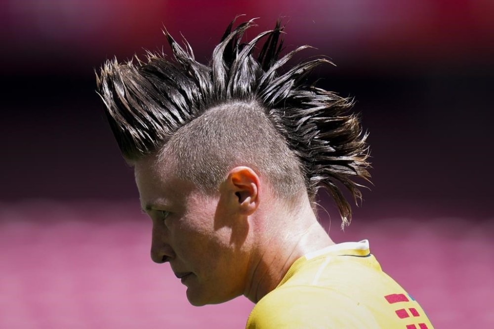 FILE - Raquel Kochhann of Brazil competes during the women's HSBC Rugby Sevens match between Brazil and Belgium in Madrid, Spain, Friday, May 31, 2024. A breast cancer diagnosis, surgery and months of follow-up treatment didn't shake Kochhann's desire to return to rugby sevens and have a shot at a third Olympics. (AP Photo/Bernat Armangue,File)