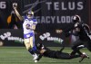 Winnipeg Blue Bombers quarterback Zach Collaros (8) throws the ball while under pressure from Ottawa Redblacks' Damon Webb (9) during CFL action in Ottawa on Thursday, June 13, 2024. It's only their third game of the season but it's certainly an important one for Collaros and the Blue Bombers. Winnipeg (0-2) hosts the B.C. Lions (1-1) on Friday night looking to put a halt to their surprisingly slow start. THE CANADIAN PRESS/ Patrick Doyle