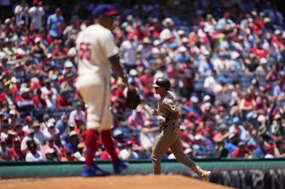 San Diego Padres' Jackson Merrill rounds the bases after hitting a home run against Philadelphia Phillies pitcher Ranger Suarez during the second inning of a baseball game, Wednesday, June 19, 2024, in Philadelphia. (AP Photo/Matt Slocum)
