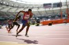 FILE -Erriyon Knighton, of the United States, competes in a Men's 200-meter heat during the World Athletics Championships in Budapest, Hungary, Wednesday, Aug. 23, 2023. Sprinter Erriyon Knighton tested positive for a banned substance that an arbitration panel determined came from contaminated meat, a decision that keeps the 200-meter specialist eligible to run at the upcoming Olympic trials, Wednesday, June 19, 2024. (AP Photo/Bernat Armangue, File)