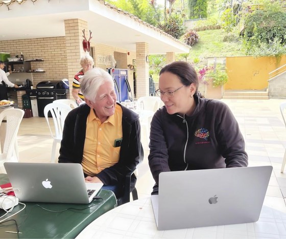 Neurologist Dr. Francisco Lopera, right, of the University of Antioquia, confers with fellow researcher Yakeel Quiroz of Massachusetts General Hospital. (Massachusetts General Hospital via The Associated Press)