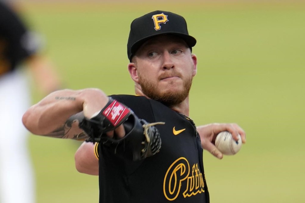 Pittsburgh Pirates starting pitcher Bailey Falter delivers during the second inning of the team's baseball game against the Cincinnati Reds in Pittsburgh, Tuesday, June 18, 2024. (AP Photo/Gene J. Puskar)