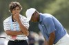 Tiger Woods putts as his son, Charlie watches on the 18th hole during a practice round for the U.S. Open golf tournament Monday, June 10, 2024, in Pinehurst, N.C. (AP Photo/Matt York)