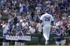 Chicago Cubs fans cheer Chicago Cubs pitcher Kyle Hendricks as he leaves during the sixth inning of a baseball game against the San Francisco Giants in Chicago, Wednesday, June 19, 2024. (AP Photo/Nam Y. Huh)