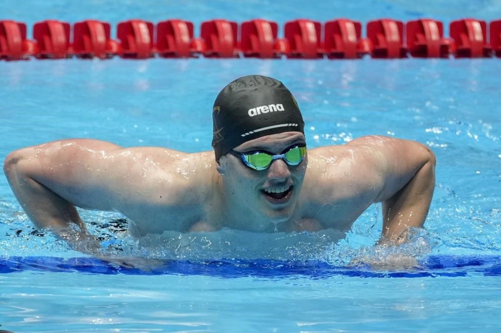 Thomas Heilman reacts after the Men's 200 butterfly finals Wednesday, June 19, 2024, at the US Swimming Olympic Trials in Indianapolis. (AP Photo/Darron Cummings)