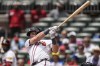 Atlanta Braves catcher Sean Murphy (12) hits a two-run homer in the fifth inning of a baseball game against the Detroit Tigers, Wednesday, June 19, 2024, in Atlanta. (AP Photo/Mike Stewart)