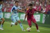 St. Louis City's Akil Watts, right, and Colorado Rapids' Cole Bassett challenge for the ball during the first half of an MLS soccer match Wednesday, June 19, 2024, in St. Louis. (AP Photo/Jeff Roberson)