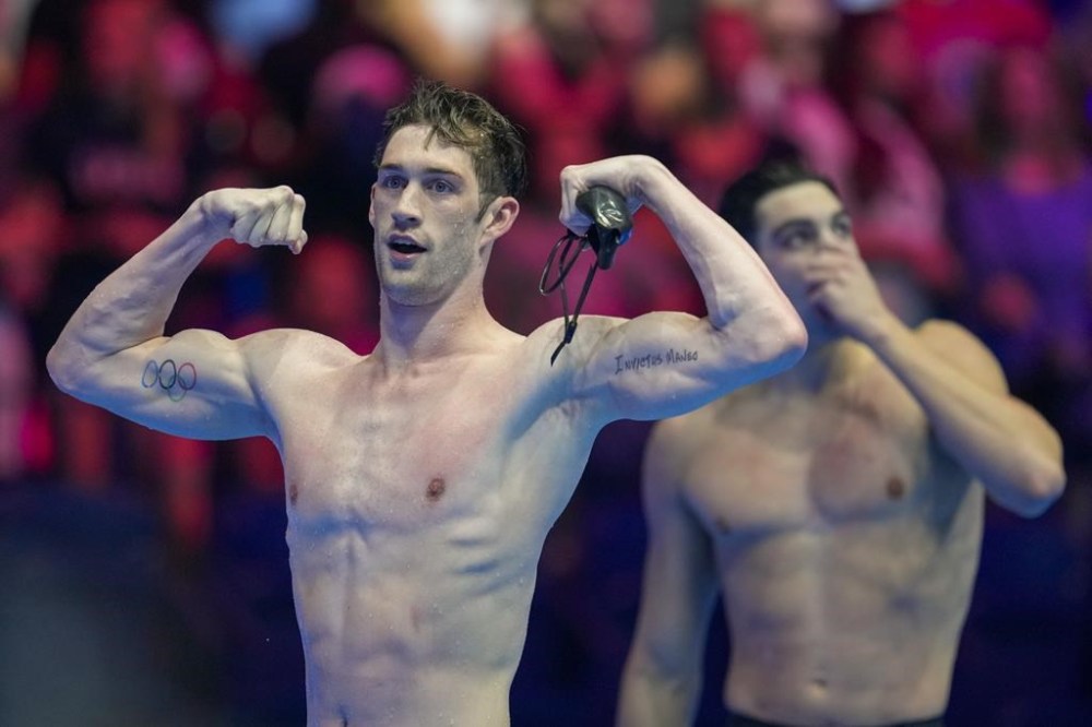 Chris Guiliano reacts after winning the Men's 100 freestyle finals Wednesday, June 19, 2024, at the US Swimming Olympic Trials in Indianapolis. (AP Photo/Michael Conroy)