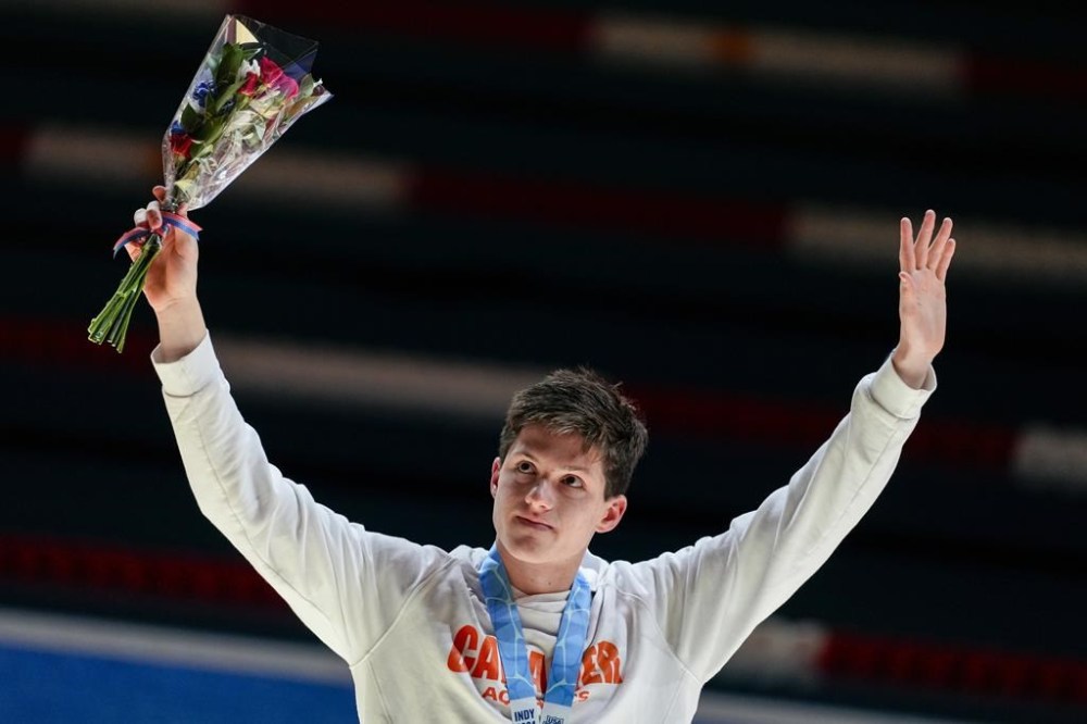 Thomas Heilman celebrates after the Men's 200 butterfly finals Wednesday, June 19, 2024, at the US Swimming Olympic Trials in Indianapolis. (AP Photo/Darron Cummings)