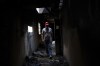 Store manager Oleksandr Lutsenko walks inside the Epicenter shopping complex in Kharkiv, Ukraine, Thursday, June 6, 2024. The bombing of the Epicenter with glide bombs by the Russian military in May killed 19 people, including two children. In all, glide bombs have hit the city more than 50 times in 2024, according to Spartak Borysenko of the Kharkiv regional prosecutor's office. (AP Photo/Evgeniy Maloletka)