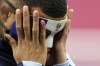 France's Kylian Mbappe adjusts his face mask during a training session in Leipzig, Germany, Thursday, June 20, 2024. France will play against Netherland during their Group D soccer match at the Euro 2024 soccer tournament on June 21. (AP Photo/Hassan Ammar)