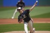 Cleveland Guardians' Logan Allen pitches in the first inning of a baseball game against the Seattle Mariners, Thursday, June 20, 2024, in Cleveland. (AP Photo/Sue Ogrocki)