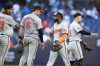 Baltimore Orioles' Cedric Mullins (31) celebrates with Ramón Urías (29), Ryan Mountcastle (6) and Nick Vespi after the team's baseball game against the New York Yankees, Thursday, June 20, 2024, in New York. The Orioles won 17-5. (AP Photo/Frank Franklin II)